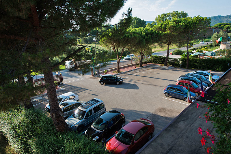 The large parking area at Hotel Torricella - 3 star hotel with free parking by Lake Trasimeno