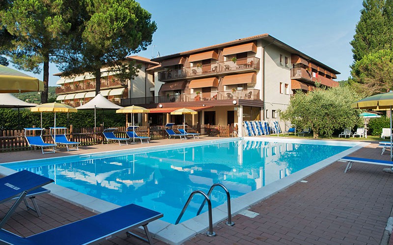 View of Hotel Torricella from the outdoor swimming pool - 3 star hotel with swimming pool by Lake Trasimeno